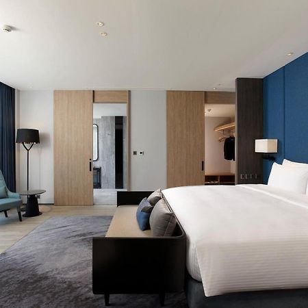 คอซซี บลู Hotel จงลี่ ภายนอก รูปภาพ A bedroom at the hotel
